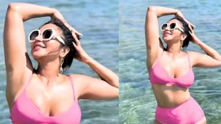 Shama Sikander took a dip in the sea in a hot pink swimsuit