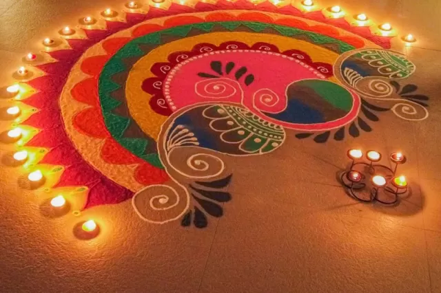 Rangoli With Diyas and Candles
