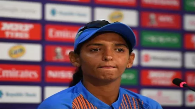 Harmanpreet Kaur surrounded by her behavior in
