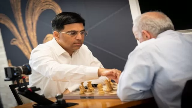 kasparov clinches victory early anand finishes strong 2