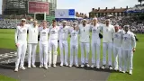 Why did the England team come out wearing white hair bands?