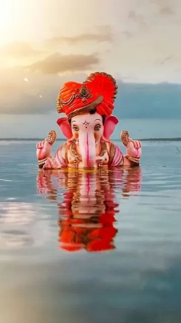 Donating things during Ganesh Visarjan Picture