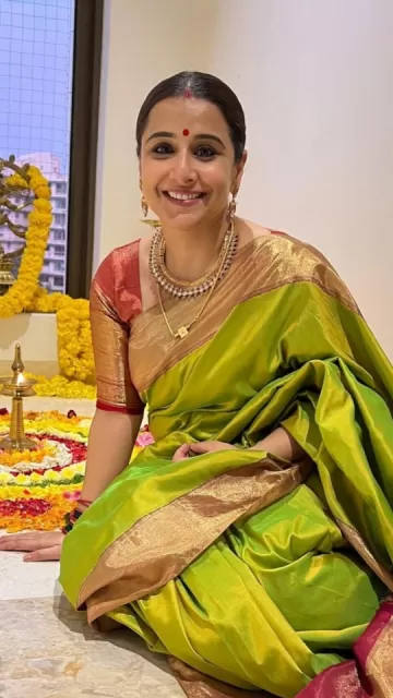 Gajra in hair, bindi on Picture
